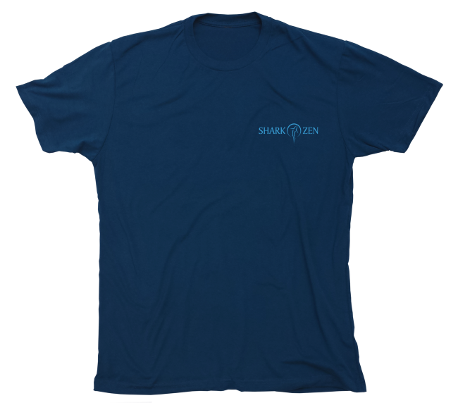 Front of navy manta ray beachscape t-shirt, blue Shark Zen logo on front left chest.